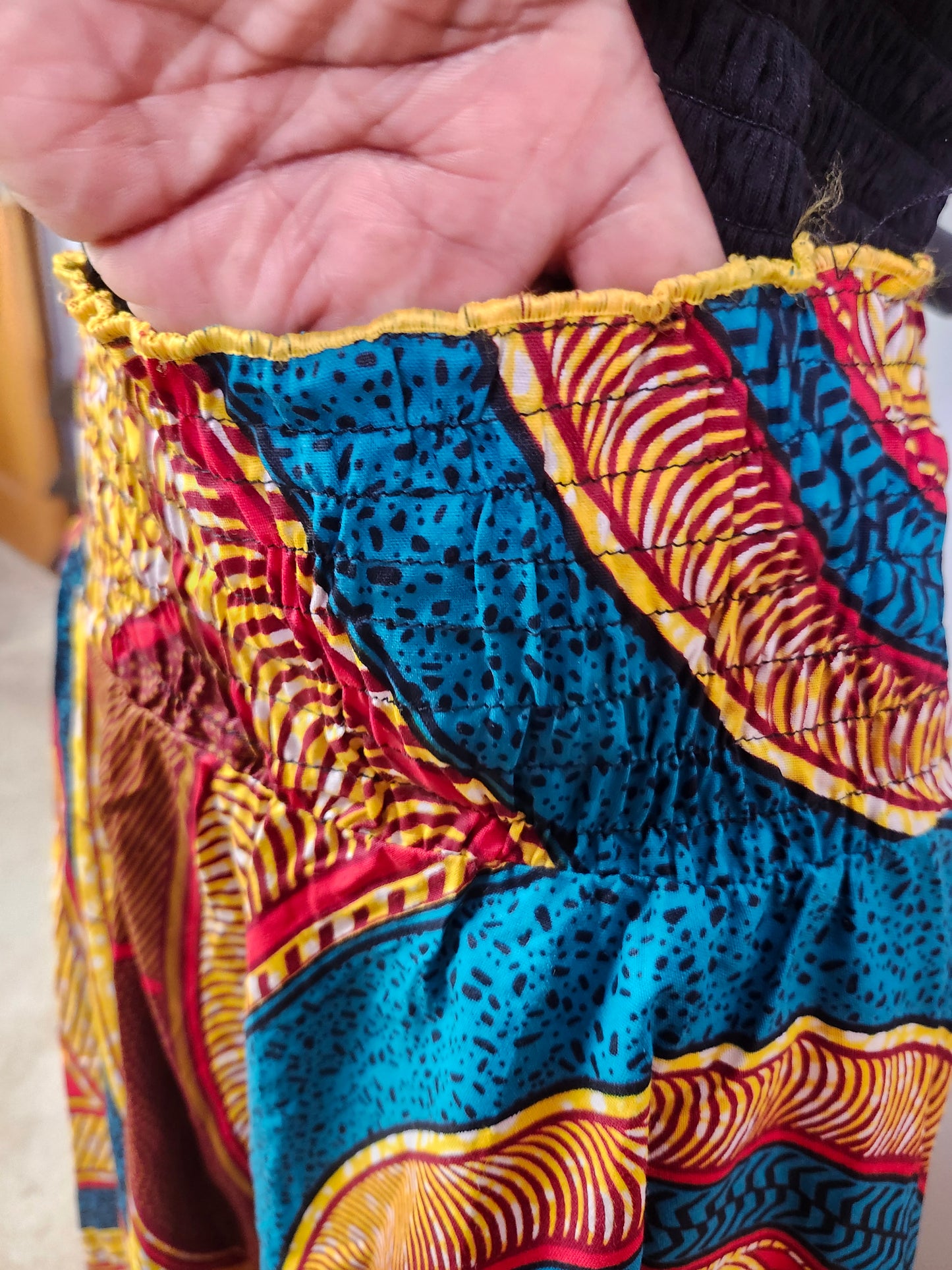 Turquoise, yellow, red, and shade of brown geometric patterns Maxi Skirt