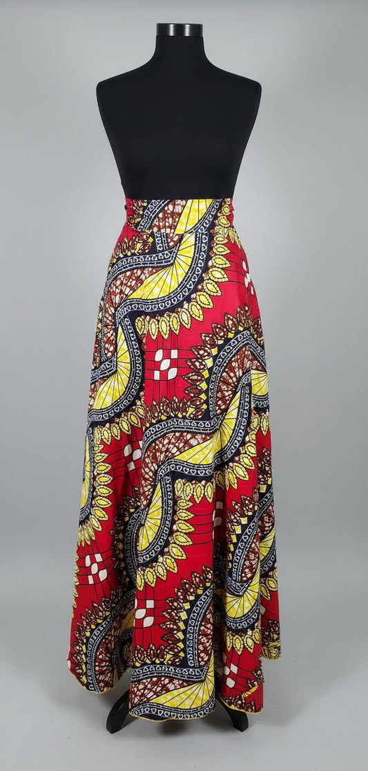 Vibrant yellow, red and white patterned maxi skirt on runway mannequin