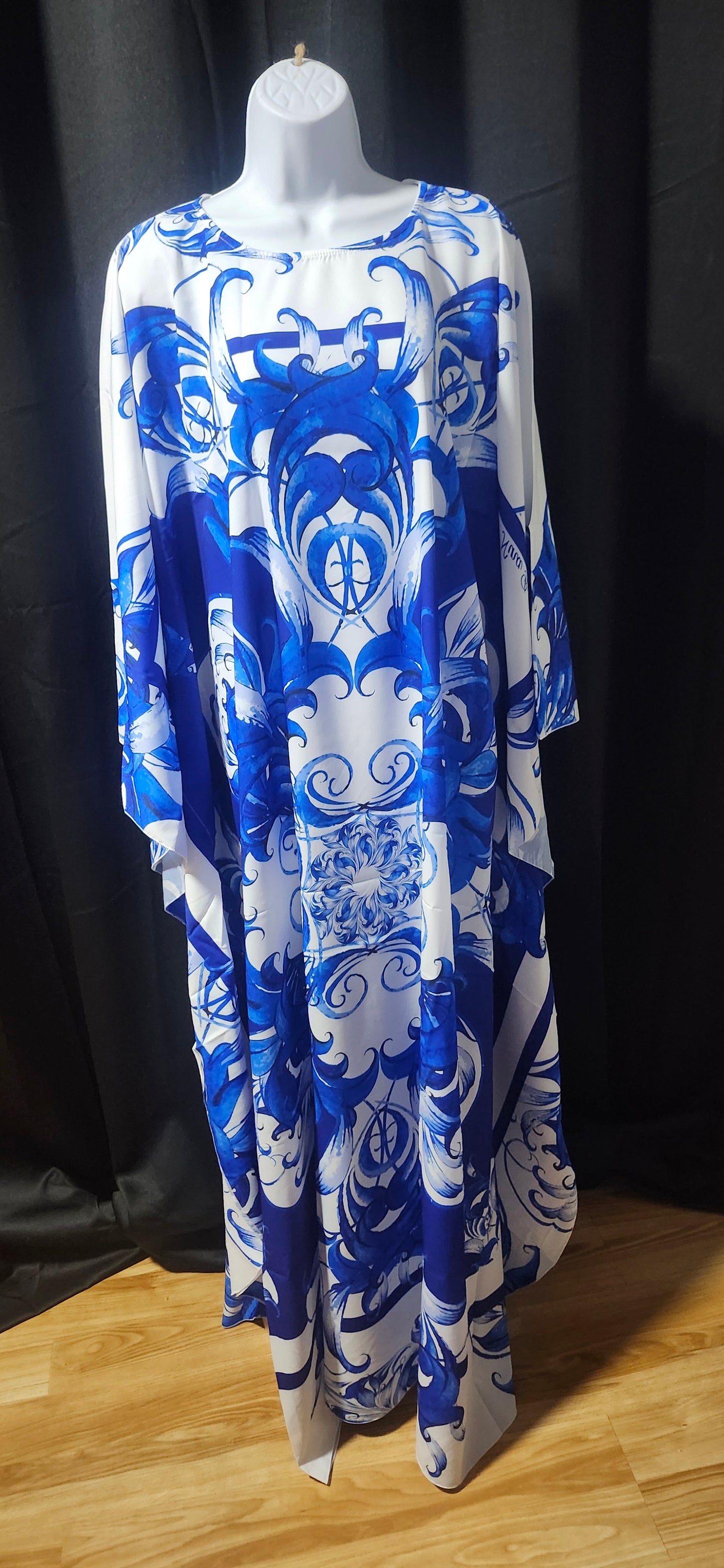 Blue and white patterned fabric on a mannequin