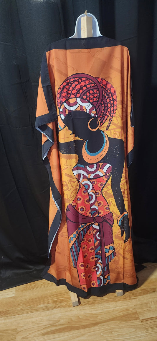 Decorative orange and black dress with an abstract design of a woman