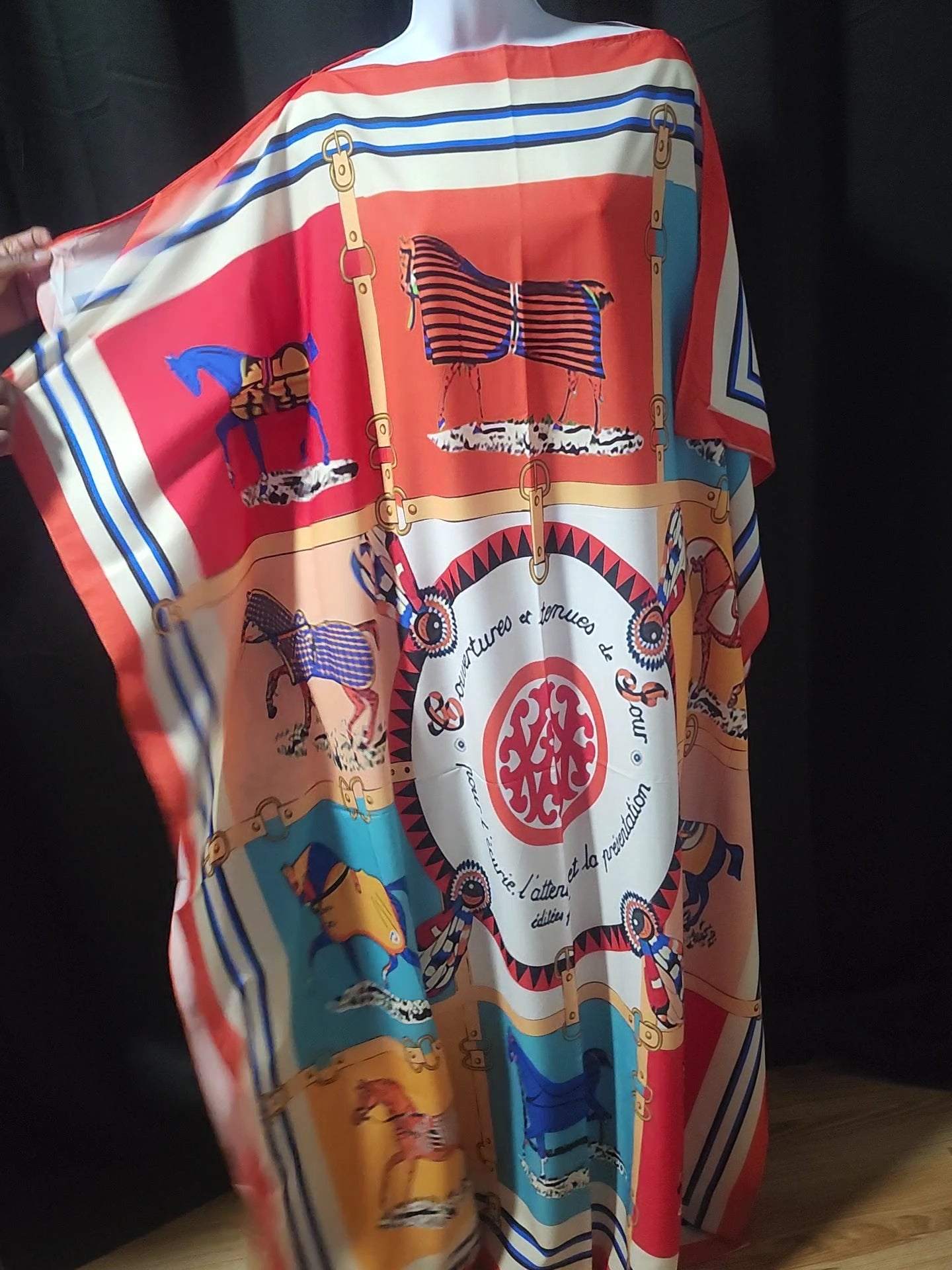 Colorful orange, red, white, and blue dress with horse design