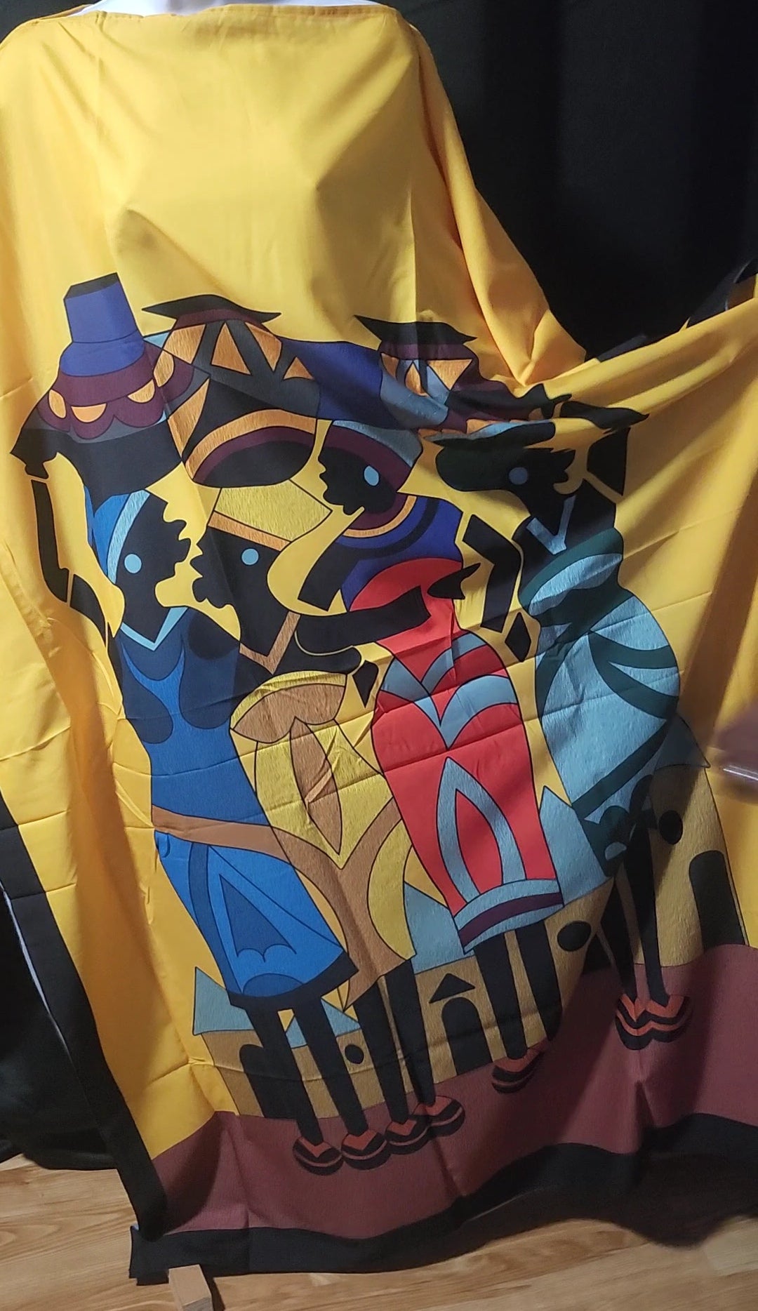 Colorful fabric with a stylized character design 